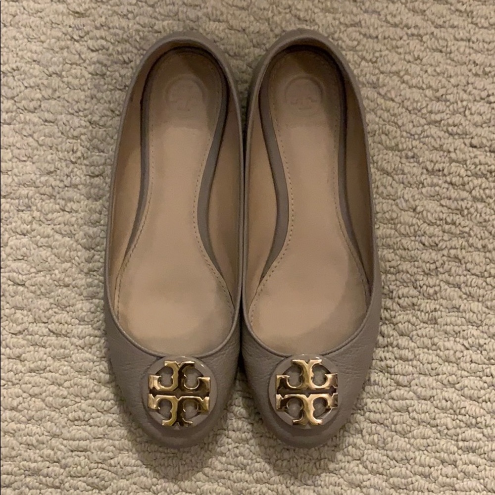 Gray Tory Burch flats with gold emblem